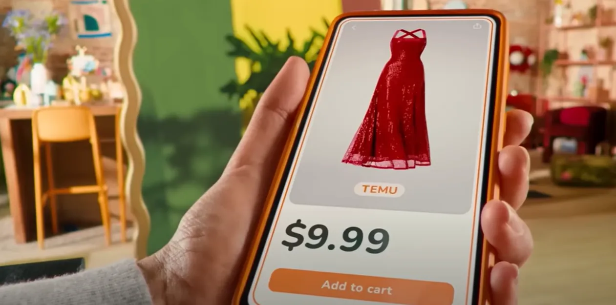 A person is holding a phone displaying the Temu app, where a red dress is sold.